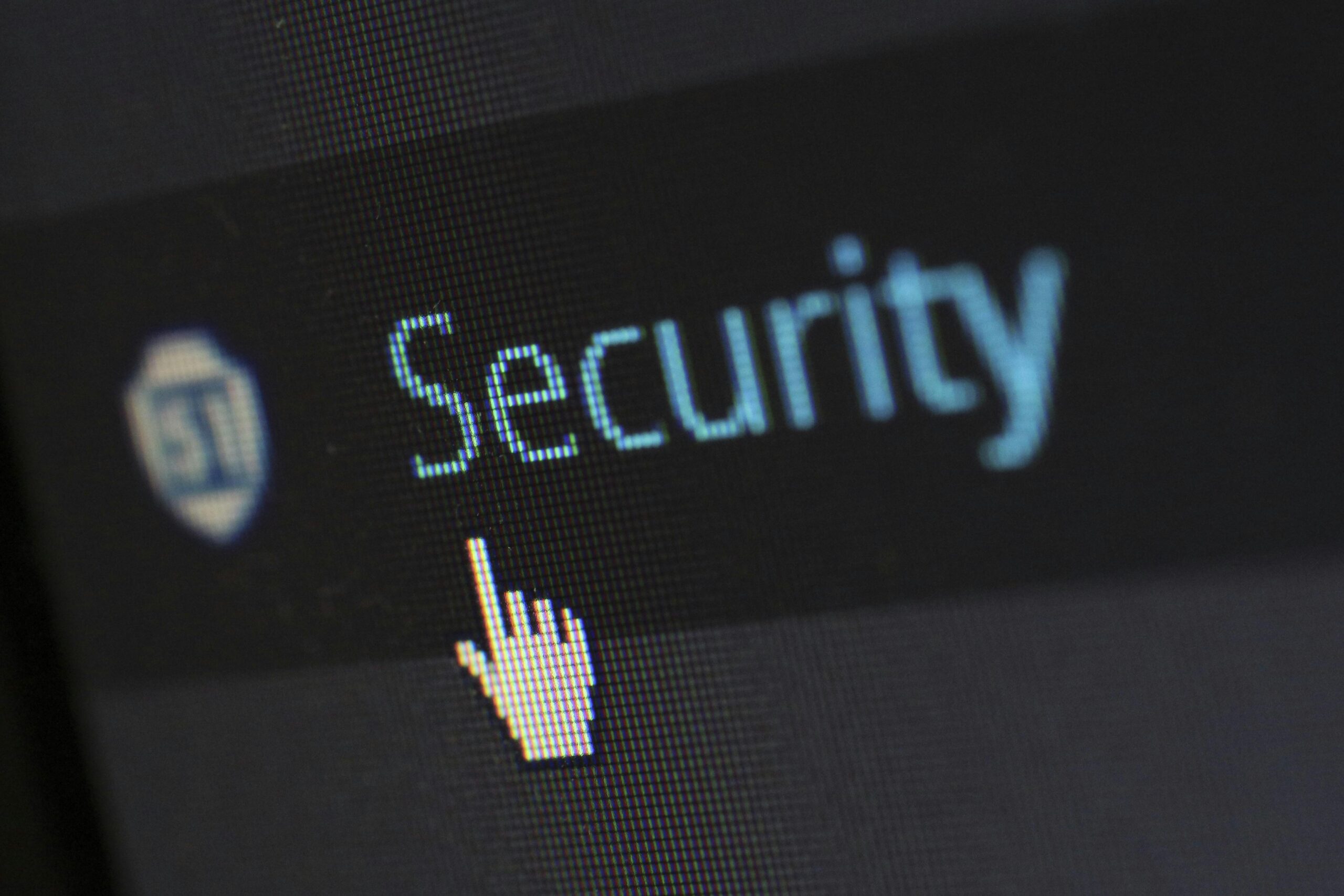 A cursor points to the word "security" on a screen